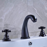 Robinet lavabo 3 trous poignées croisées laiton L'art du robinet
