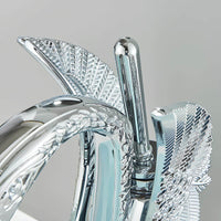 Robinet lavabo doré en forme de cygne L'art du robinet