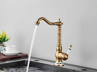 Robinet lavabo vintage bronze antique rotatif L'art du robinet